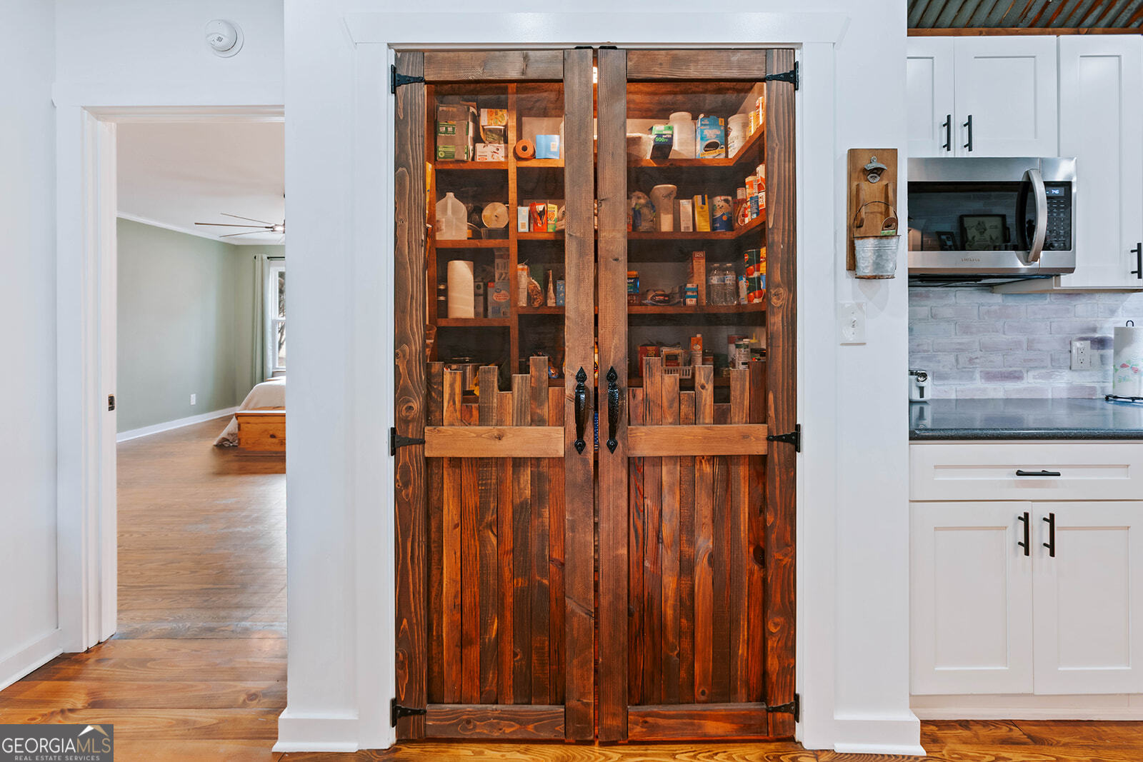 2820 Davis Academy Road Rutledge, GA 30663 - Photo 18 of 65 a view of a livingroom with furniture and staircase
