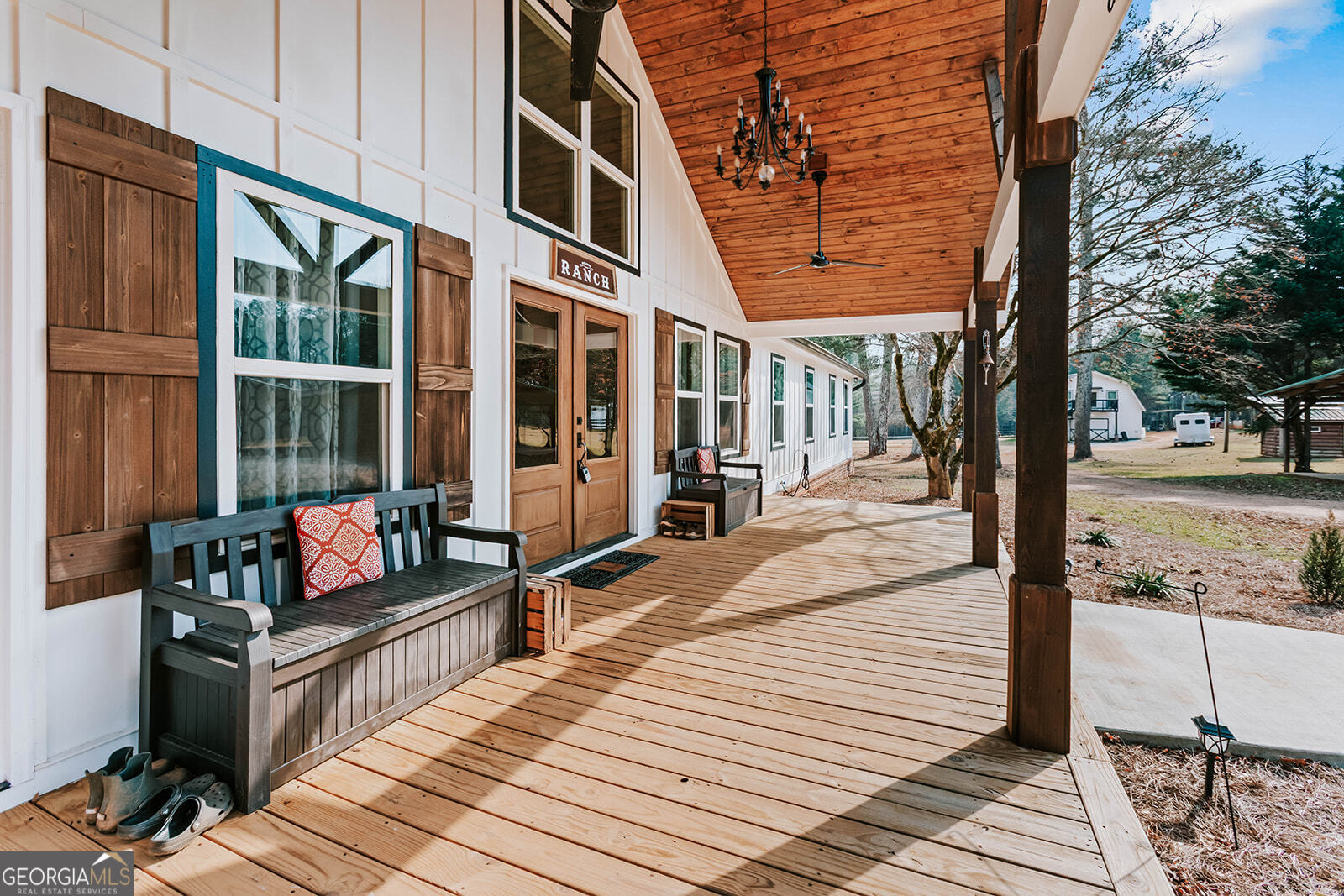 2820 Davis Academy Road Rutledge, GA 30663 - Photo 2 of 65 a view of a balcony with couch