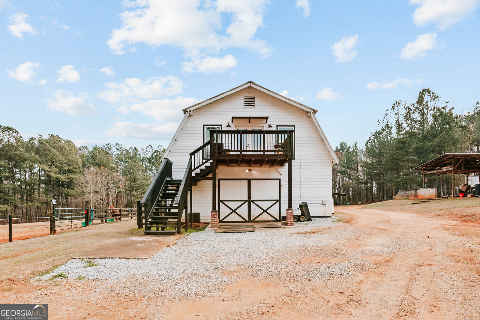 2820 Davis Academy Road Rutledge, GA 30663 - Photo 26 of 65 a view of a house with snow on the side of the road