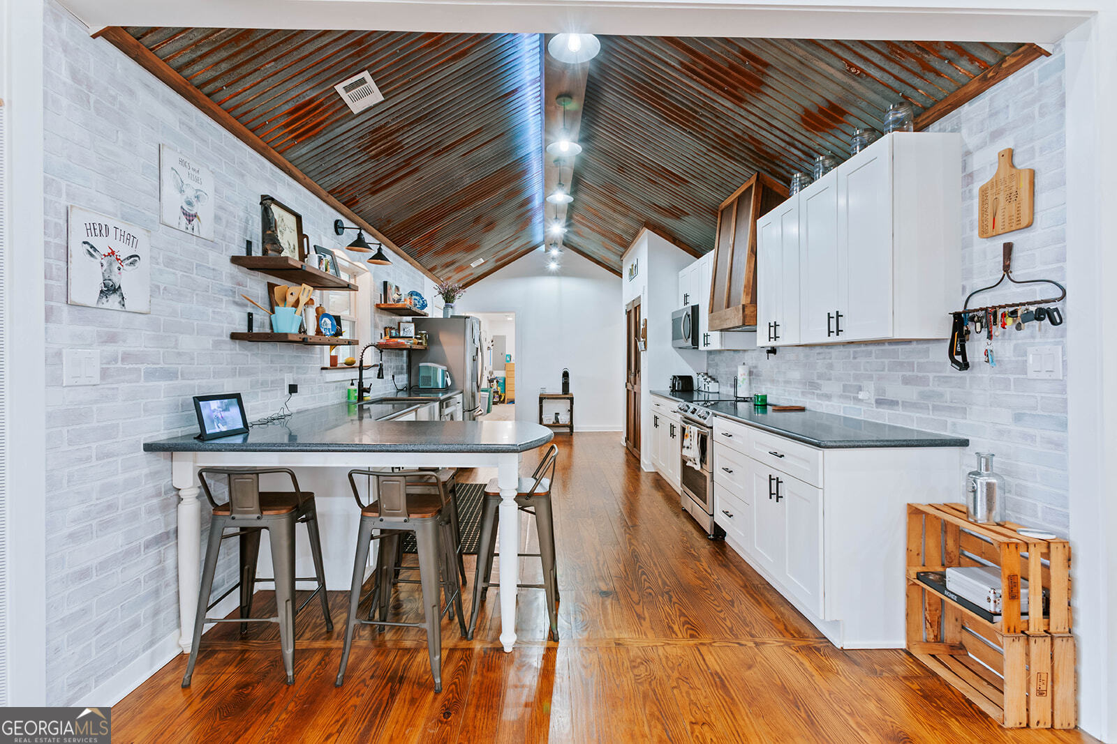 2820 Davis Academy Road Rutledge, GA 30663 - Photo 5 of 65 a kitchen with stainless steel appliances granite countertop a sink a stove and cabinets