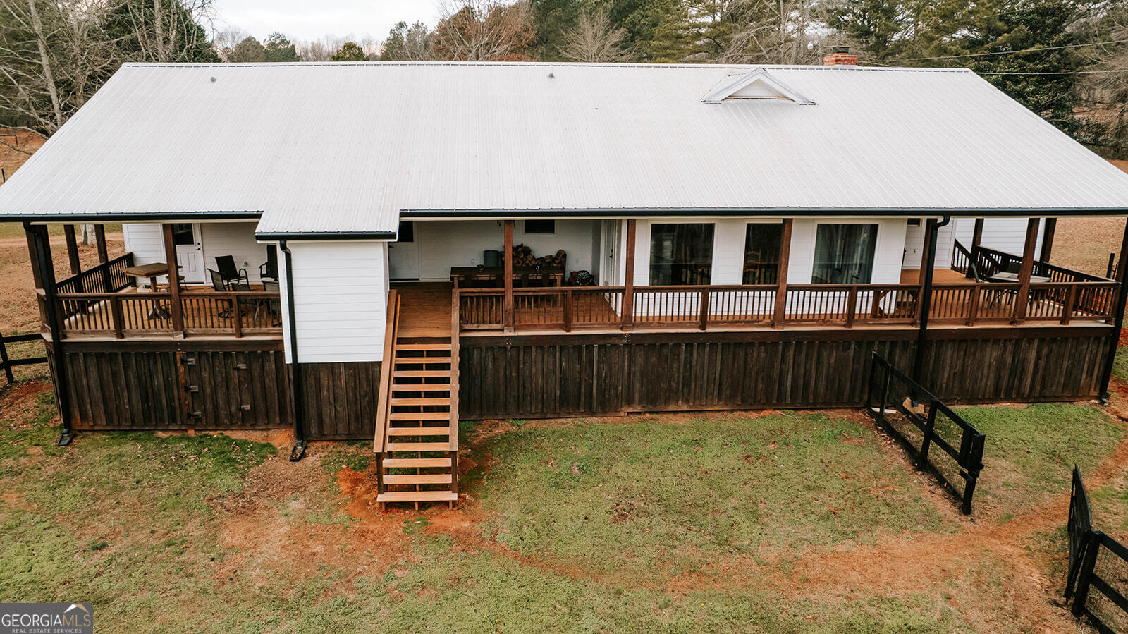 2820 Davis Academy Road Rutledge, GA 30663 - Photo 52 of 65 a view of a house with a backyard