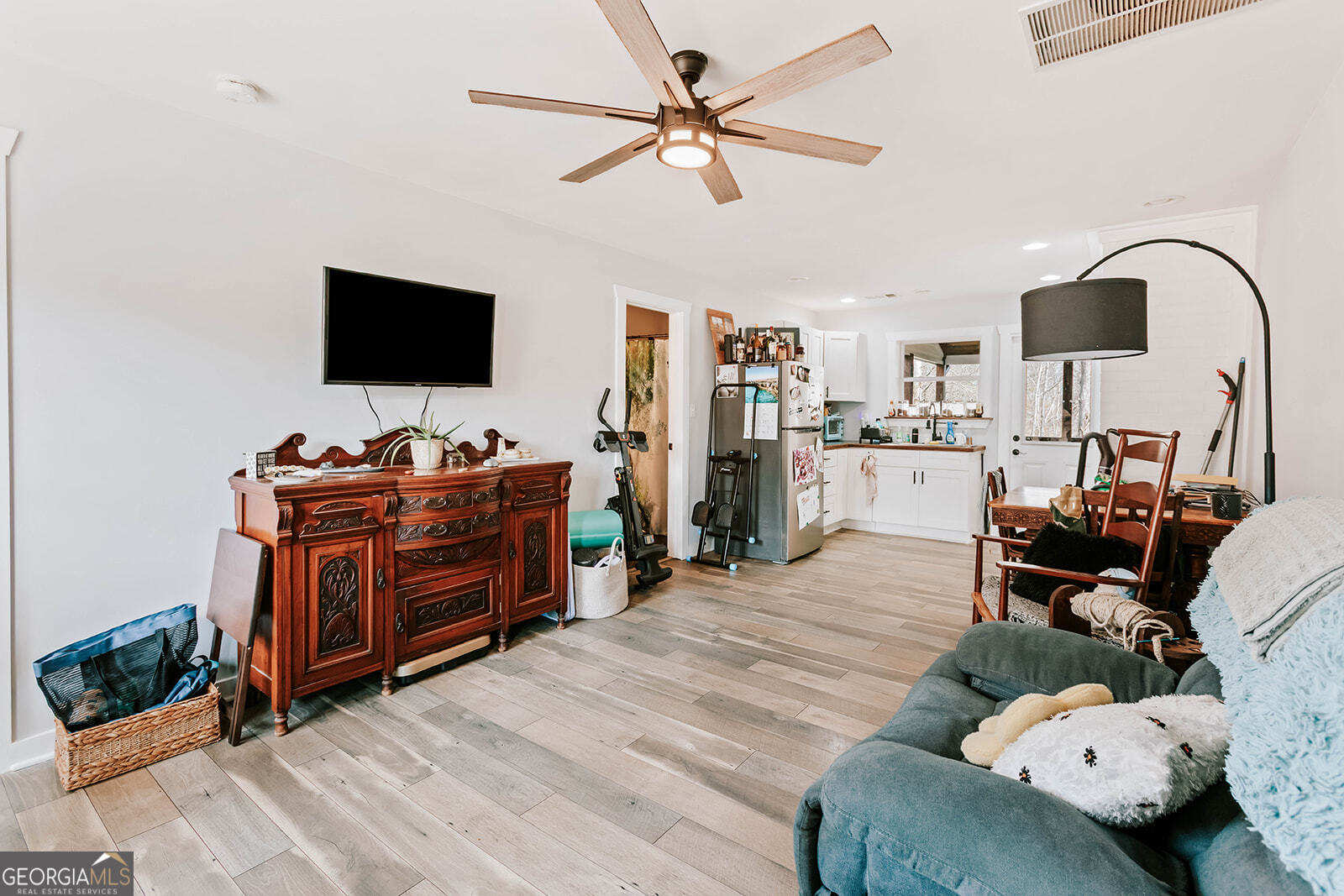 2820 Davis Academy Road Rutledge, GA 30663 - Photo 58 of 65 a living room with furniture and flat screen tv