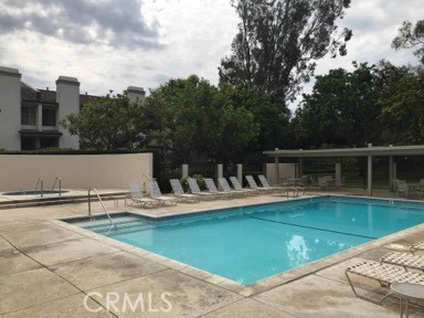 9 Evening Breeze Irvine, CA 92603 - Photo 14 of 30 a view of a swimming pool with a patio