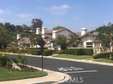 9 Evening Breeze Irvine, CA 92603 - Photo 22 of 30 a view of a street in front of a building