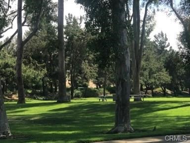 9 Evening Breeze Irvine, CA 92603 - Photo 23 of 30 a garden view with a fountain