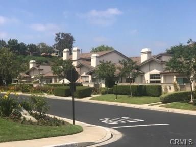 9 Evening Breeze Irvine, CA 92603 - Photo 25 of 30 a view of a street in front of a building