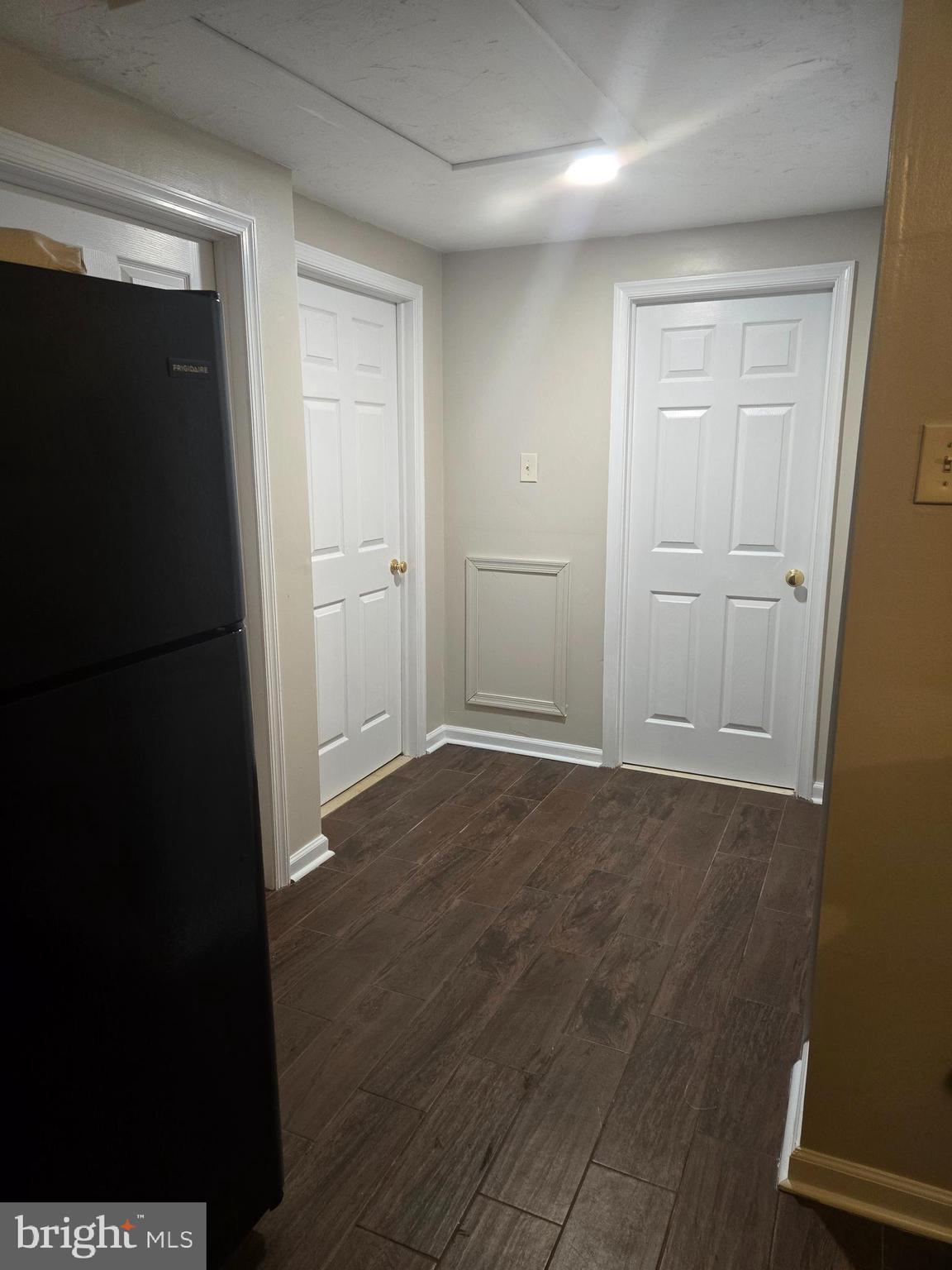 1114 Telegraph Road Coatesville, PA 19320 - Photo 5 of 10 a view of an empty room with wooden floor and closet