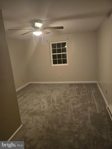 en empty room with windows