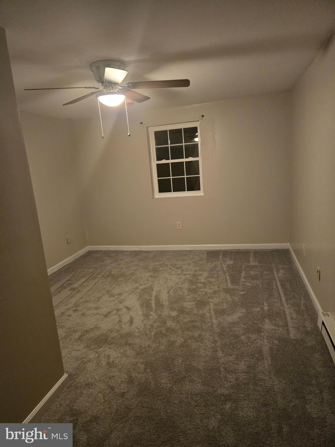 1114 Telegraph Road Coatesville, PA 19320 - Photo 6 of 10 en empty room with windows