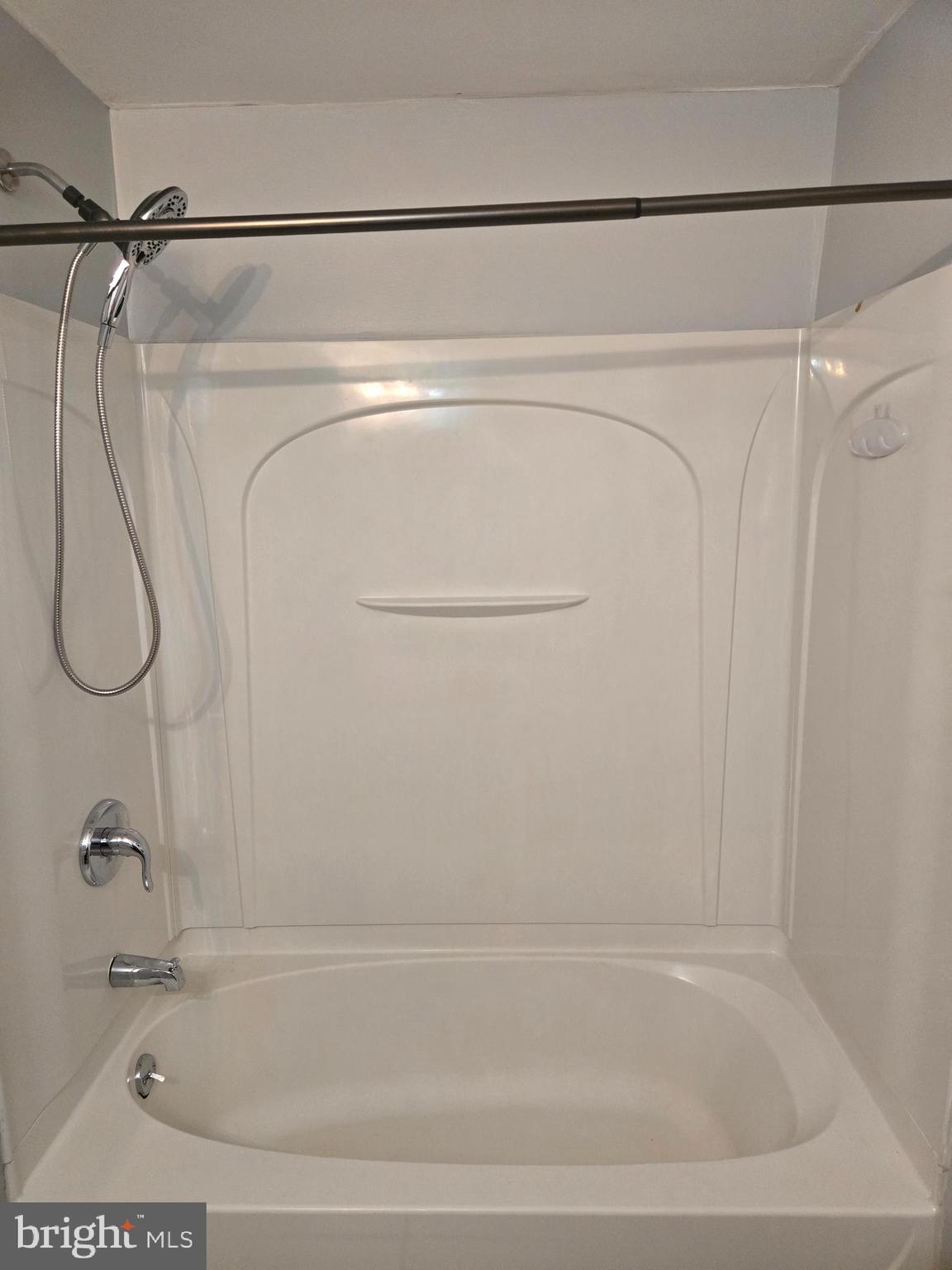 1114 Telegraph Road Coatesville, PA 19320 - Photo 9 of 10 a bathroom with a shower and a bath tub