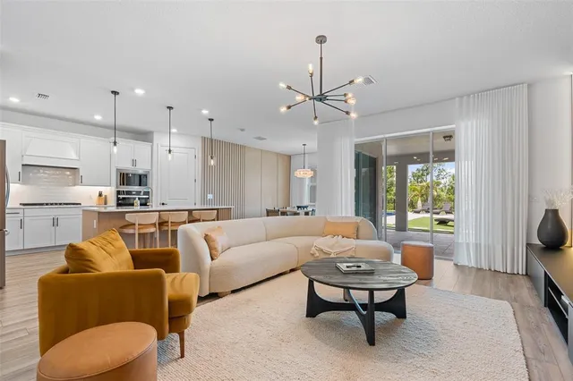 a living room with a couch and a flat screen tv