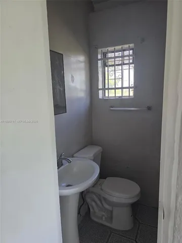 a white refrigerator freezer sitting in a kitchen