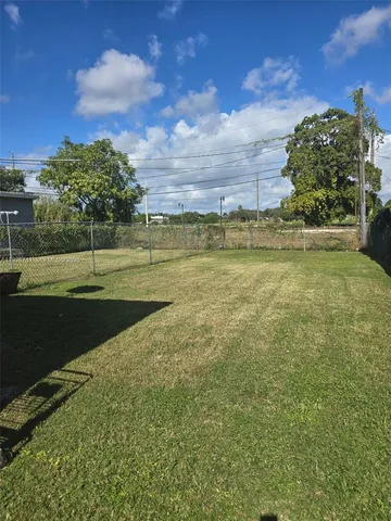 a view of a golf course with a lake
