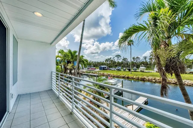 a view of a balcony with lake view