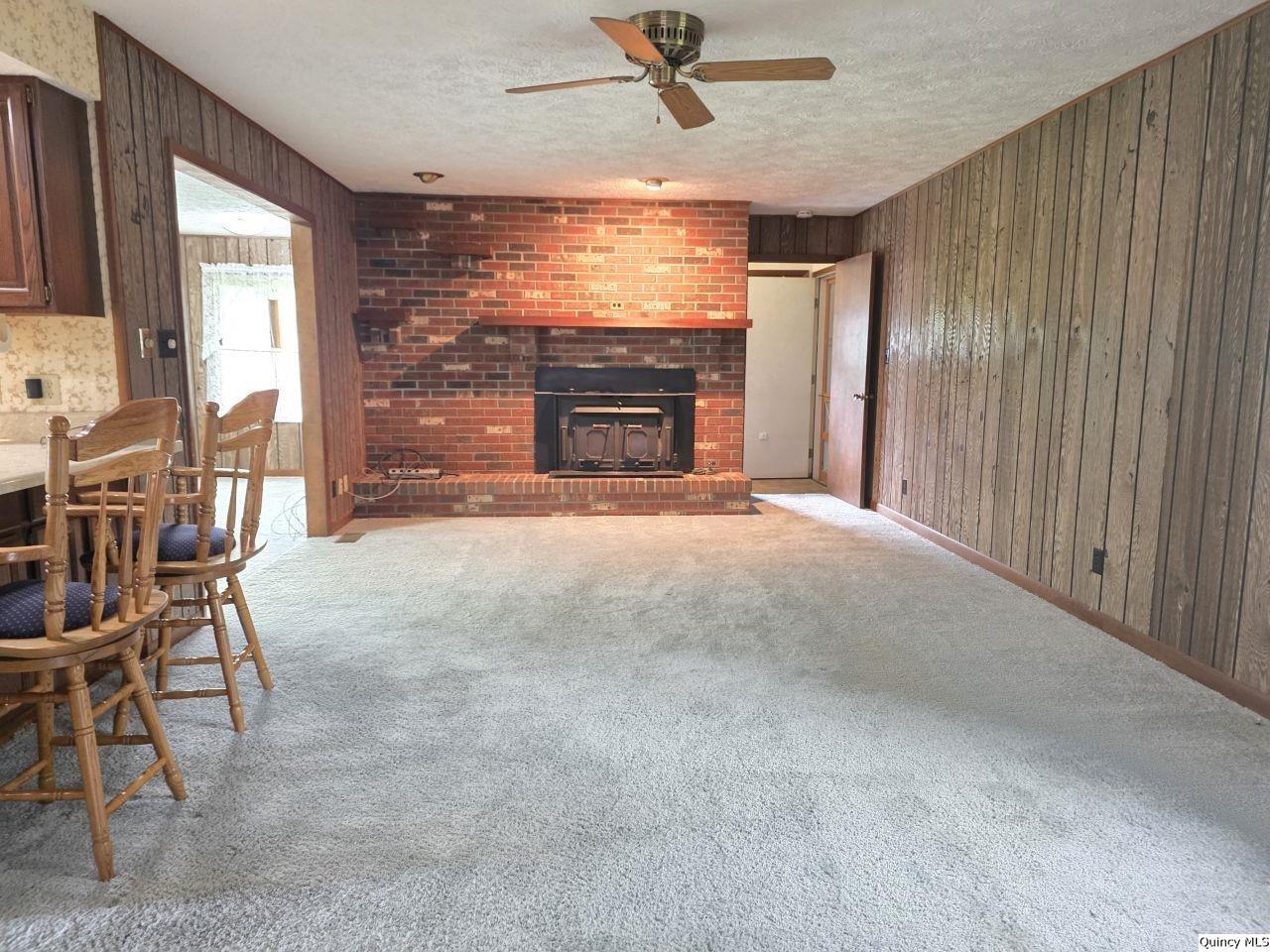 502 North Chestnut Street Versailles, IL 62378 - Photo 11 of 32 a view of an empty room with a window