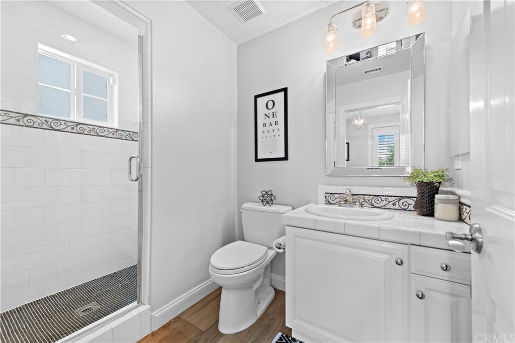 5 Tranquility Place Ladera Ranch, CA 92694 - Photo 18 of 50 Walk in shower, main level bedroom ensuite