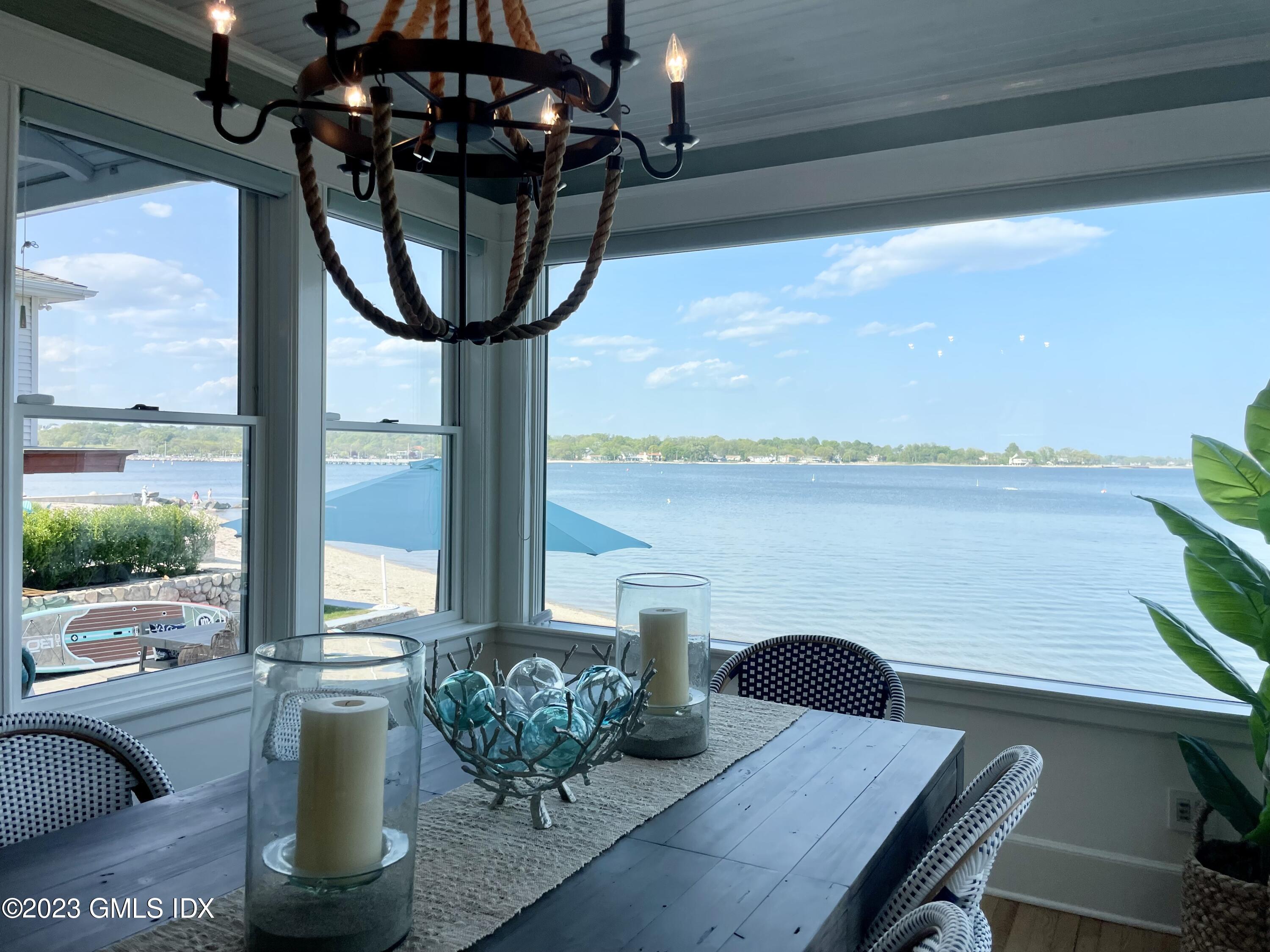 46 Ocean Drive North Stamford, CT 06902 - Photo 11 of 34 a view of a dining room with furniture window and outside view