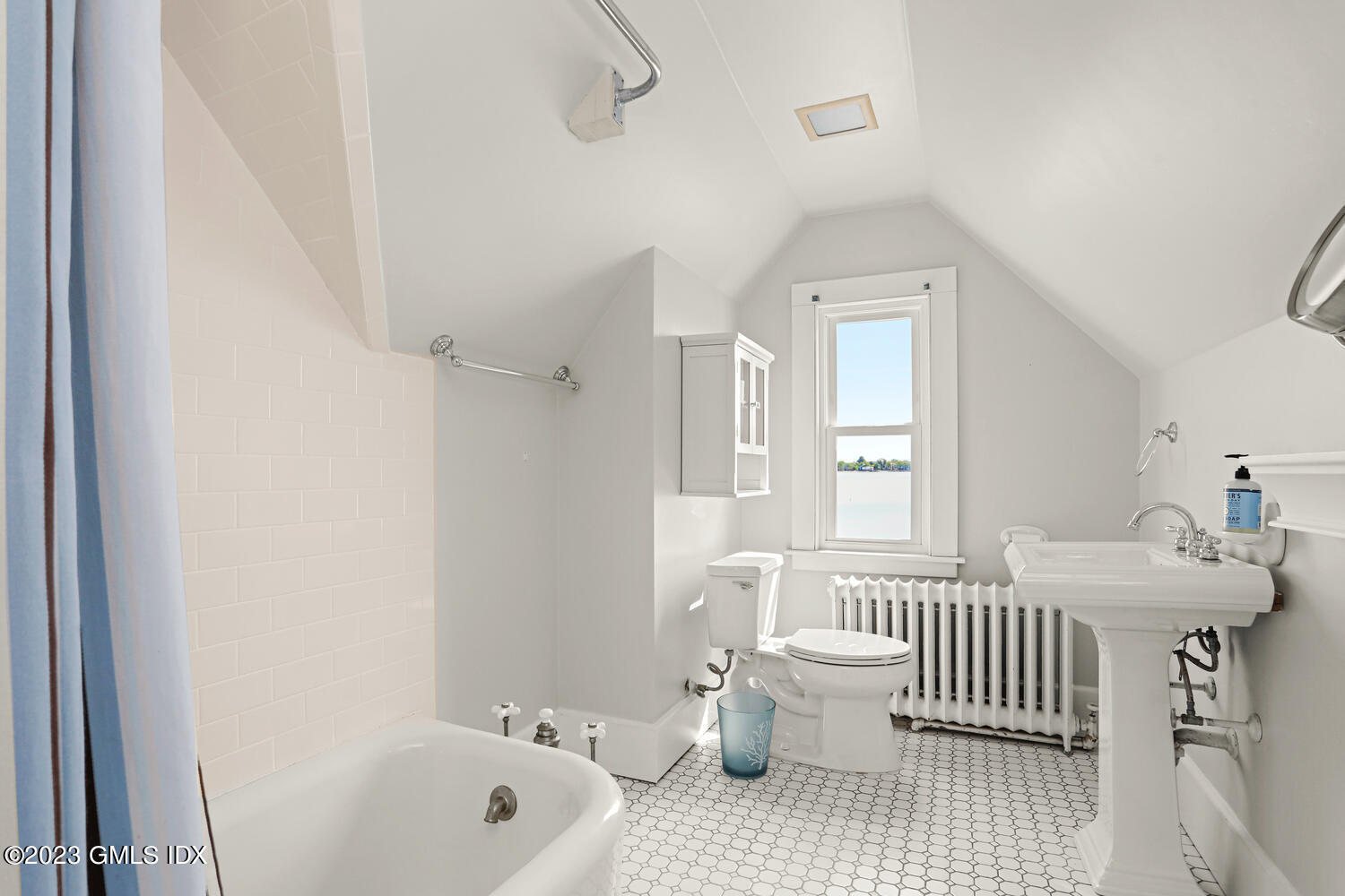 46 Ocean Drive North Stamford, CT 06902 - Photo 22 of 34 a bathroom with a sink toilet and shower