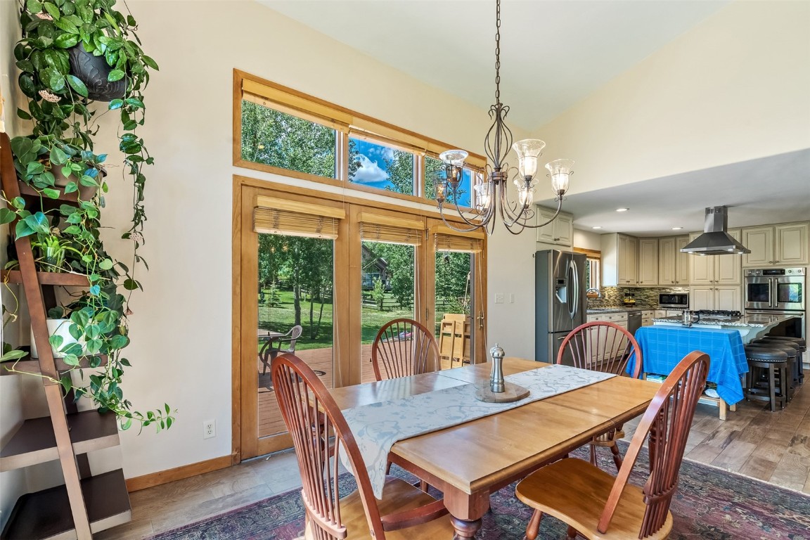 12 Raindance Trail Dillon, CO 80435 - Photo 11 of 47 a view of a dining room with furniture window and wooden floor