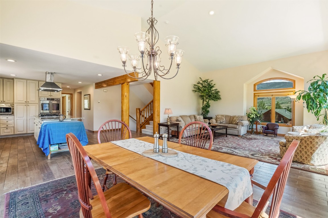 12 Raindance Trail Dillon, CO 80435 - Photo 13 of 47 a dining room with furniture a chandelier and wooden floor