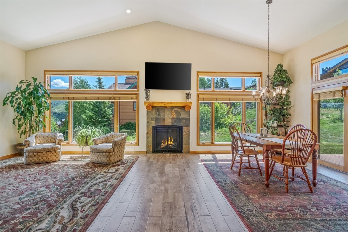 12 Raindance Trail Dillon, CO 80435 - Photo 2 of 47 a living room with furniture a fireplace and a flat screen tv
