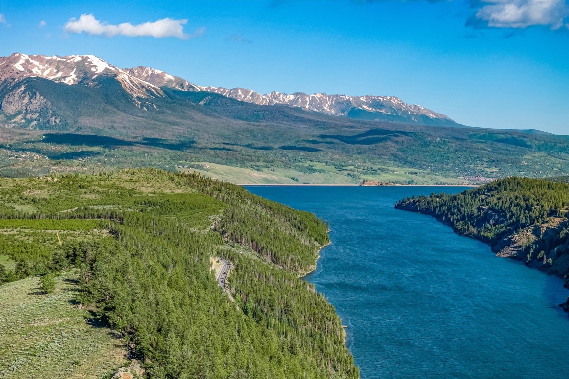 12 Raindance Trail Dillon, CO 80435 - Photo 21 of 47 a view of a big yard with an outdoor space and seating