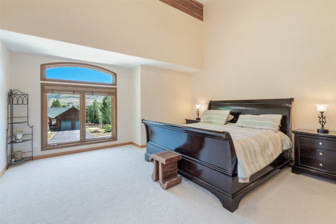 12 Raindance Trail Dillon, CO 80435 - Photo 22 of 47 a bed sitting in a room next to a window