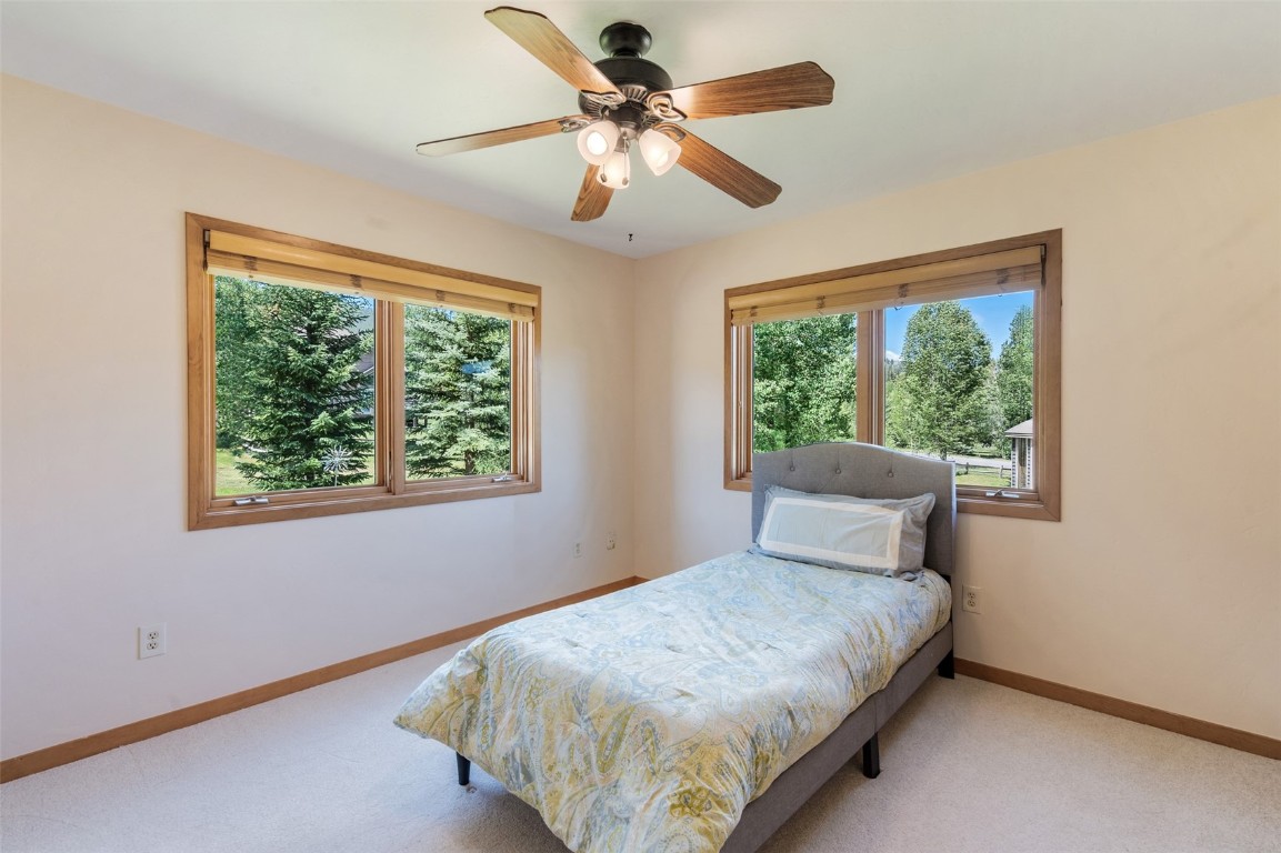12 Raindance Trail Dillon, CO 80435 - Photo 24 of 47 a bedroom with a bed and window