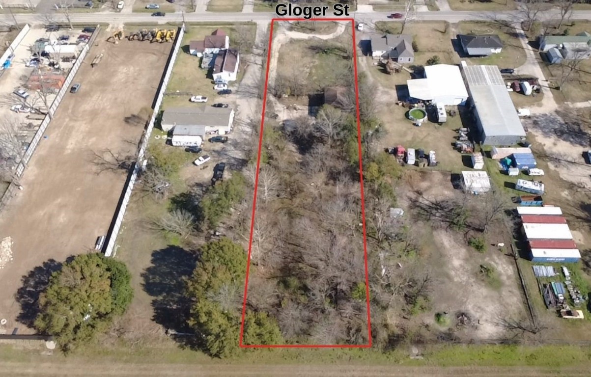 11921 Gloger Street Houston, TX 77039 - Photo 3 of 7 an aerial view of residential houses with outdoor space