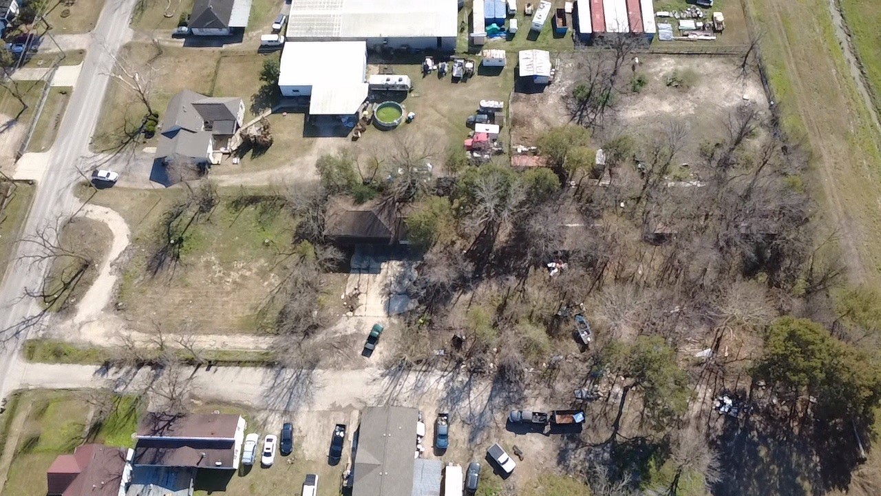11921 Gloger Street Houston, TX 77039 - Photo 7 of 7 an aerial view of residential houses with outdoor space