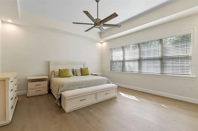 a bathroom with a shower and a sink
