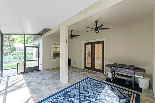an aerial view of a house with garden space and street view