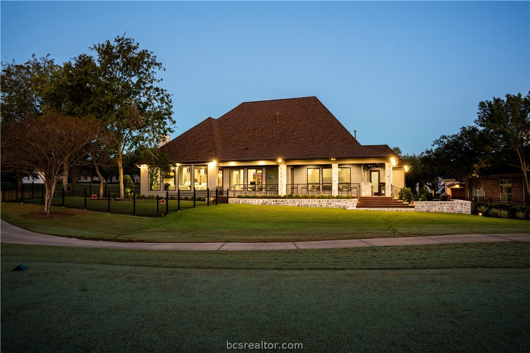 5202 Bourrone Court Bryan, TX 77802 - Photo 2 of 43 Back of home at sunset