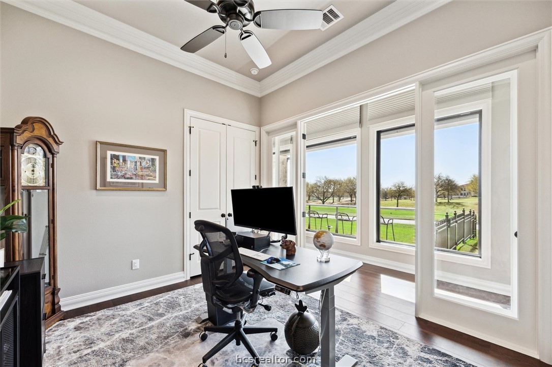 5202 Bourrone Court Bryan, TX 77802 - Photo 21 of 43 Main Office Overlooking Miramont Golf Course with glassed french doors for privacy