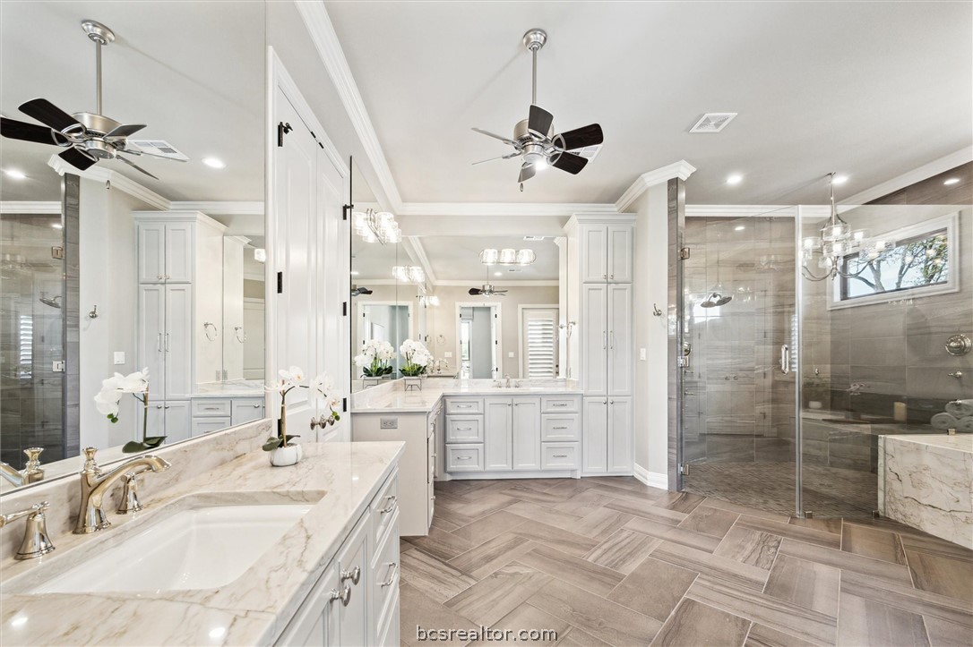 5202 Bourrone Court Bryan, TX 77802 - Photo 25 of 43 Oversized Primary Bathroom w/large walk in shower.