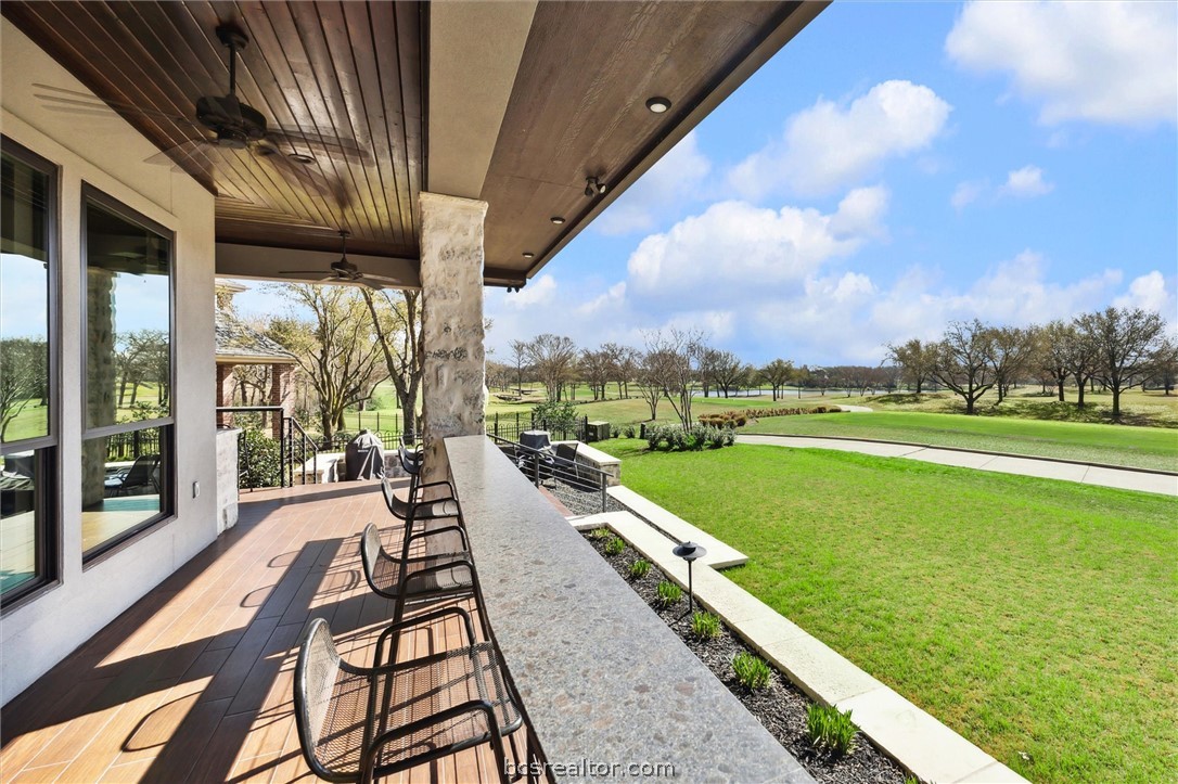 5202 Bourrone Court Bryan, TX 77802 - Photo 35 of 43 View of outdoor Patio looking on to Lake Heron and T-box #9