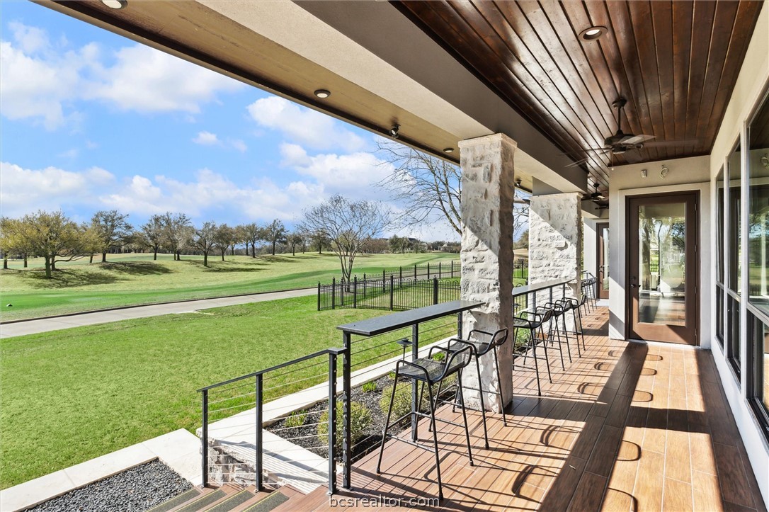 5202 Bourrone Court Bryan, TX 77802 - Photo 36 of 43 View of outdoor patio looking on to Miramont Club and T-box #9