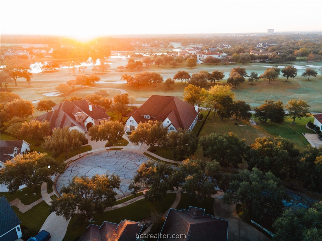 5202 Bourrone Court Bryan, TX 77802 - Photo 6 of 43 Dawn Drone / aerial view showing off the back view of the home.