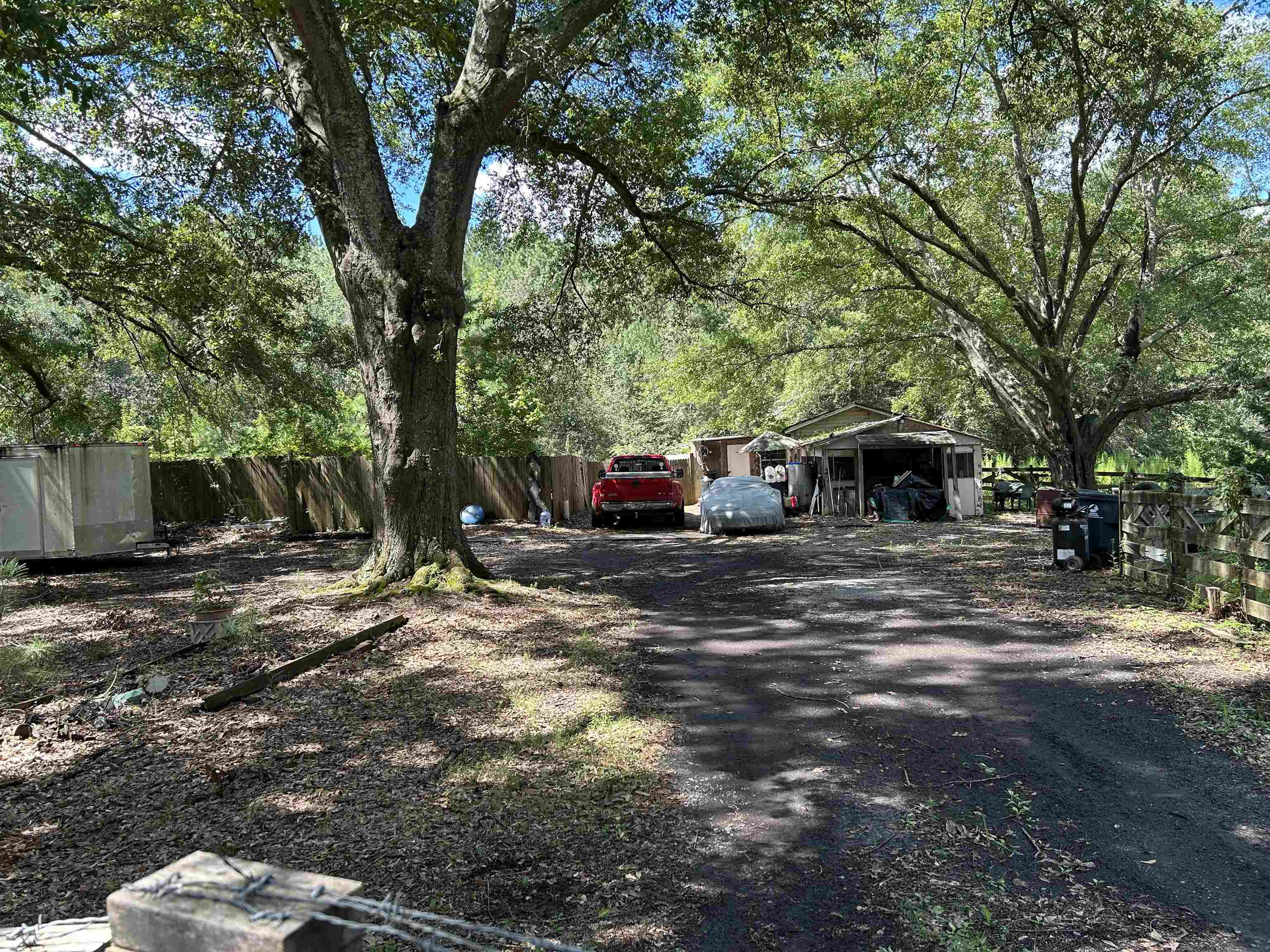 2968 Demooney Road South Fulton, GA 30349 - Photo 1 of 1 a view of a outdoor space with deck and tree