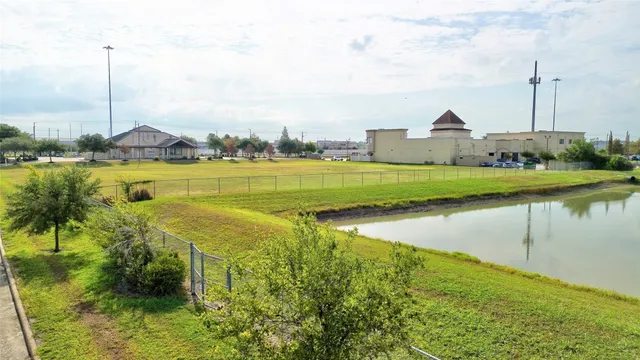 a view of a lake with a garden