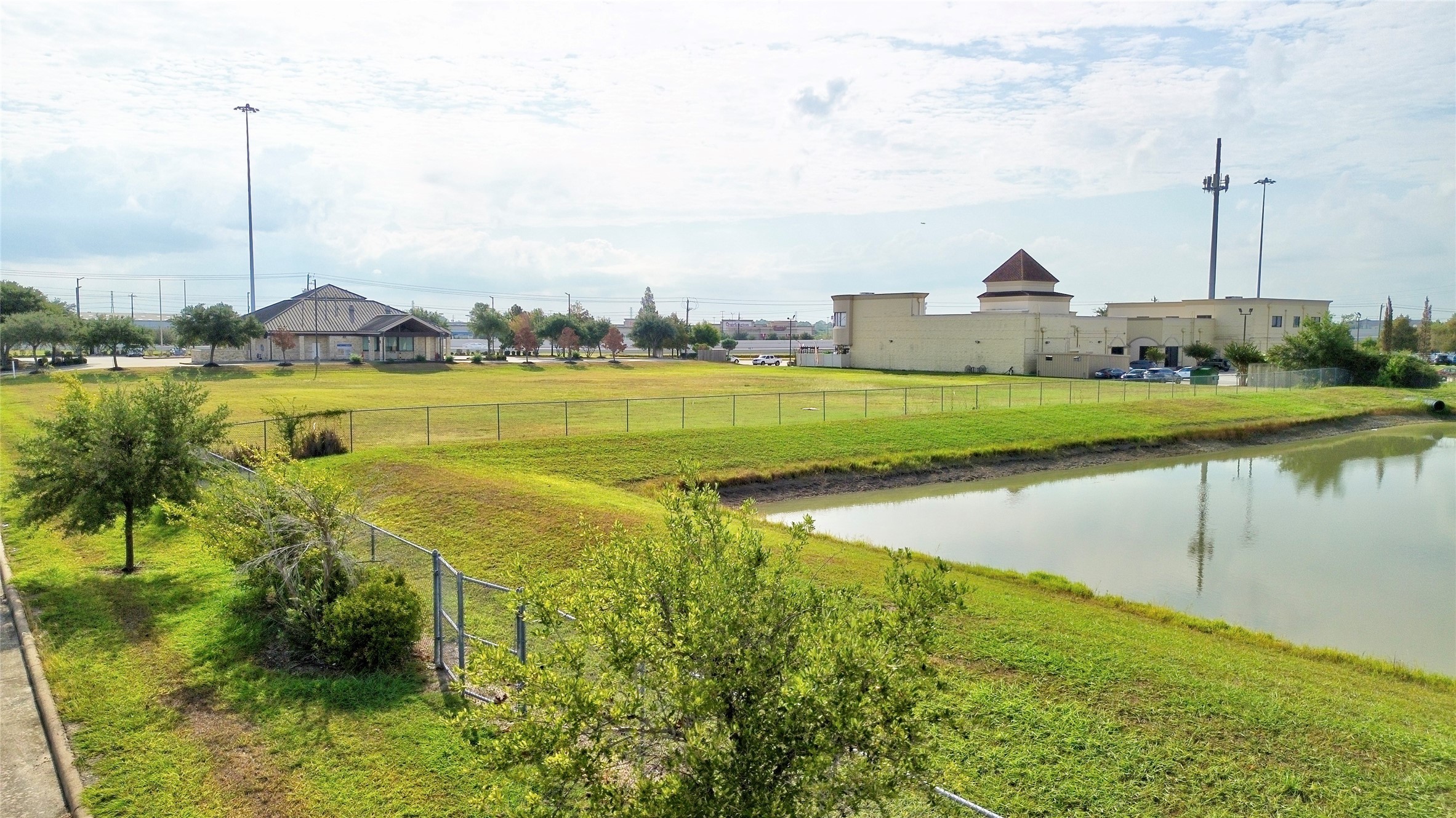 4242 Keith Road Pasadena, TX 77505 - Photo 13 of 15 Middle of detention pond view facing the front
