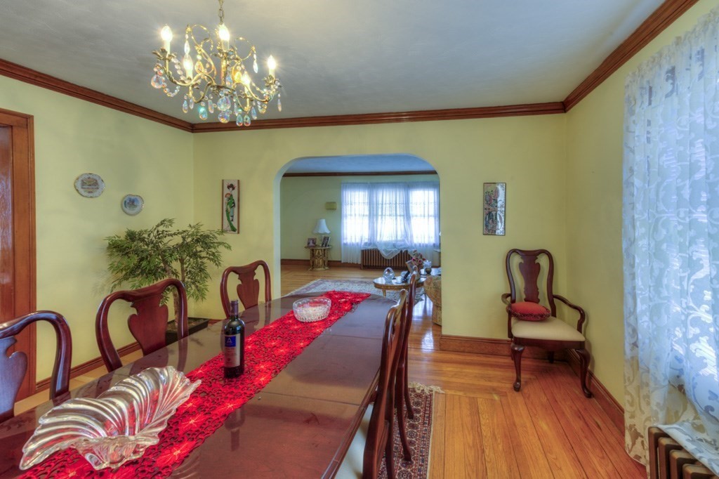 3 Longfellow Road Worcester, MA 01602 - Photo 17 of 33 a living room with furniture and a chandelier