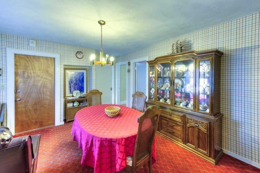 3 Longfellow Road Worcester, MA 01602 - Photo 23 of 33 a view of a dining room with furniture a chandelier and window