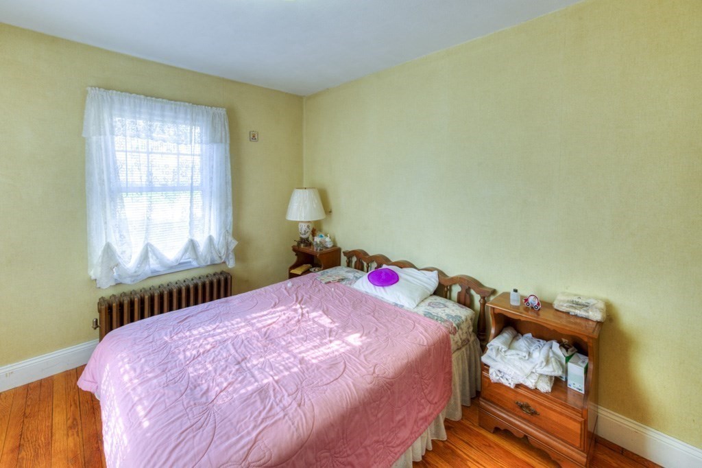 3 Longfellow Road Worcester, MA 01602 - Photo 27 of 33 a bedroom with a bed and a window
