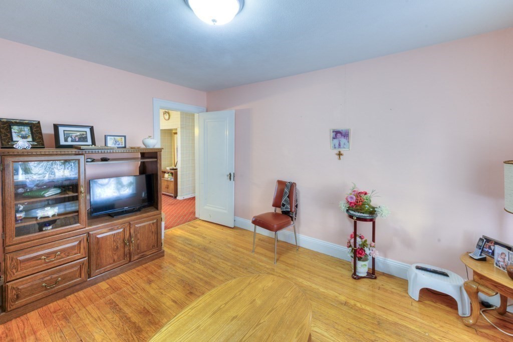 3 Longfellow Road Worcester, MA 01602 - Photo 30 of 33 a living room with furniture and a flat screen tv