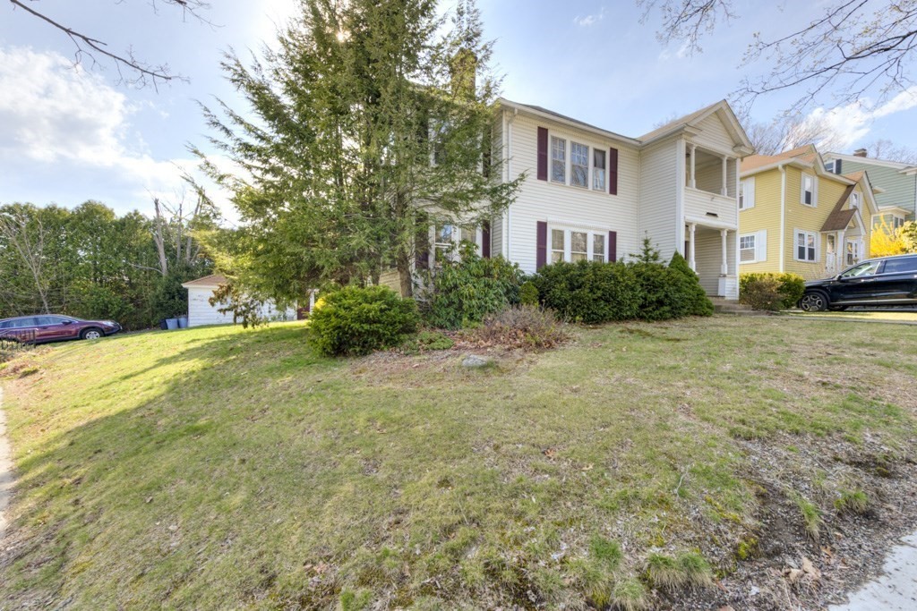3 Longfellow Road Worcester, MA 01602 - Photo 3 of 33 a front view of a house with a yard