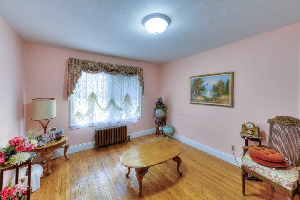 3 Longfellow Road Worcester, MA 01602 - Photo 31 of 33 a living room with furniture and a wooden floor