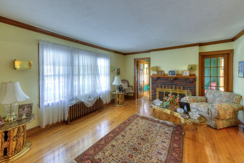 3 Longfellow Road Worcester, MA 01602 - Photo 9 of 33 a living room with furniture and a large window