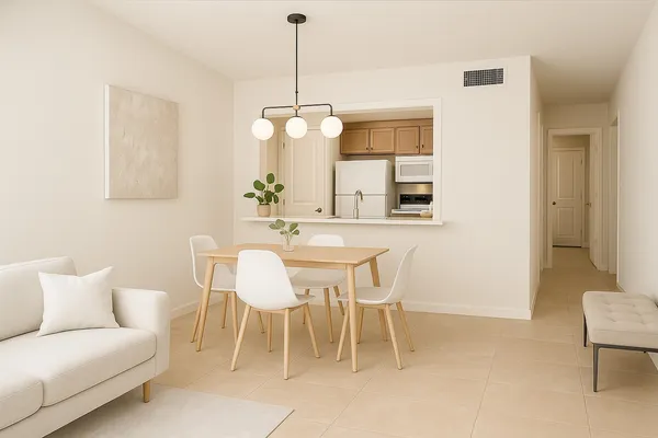 a dining room with furniture and window