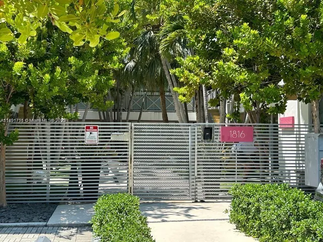 a view of a pathway with a house